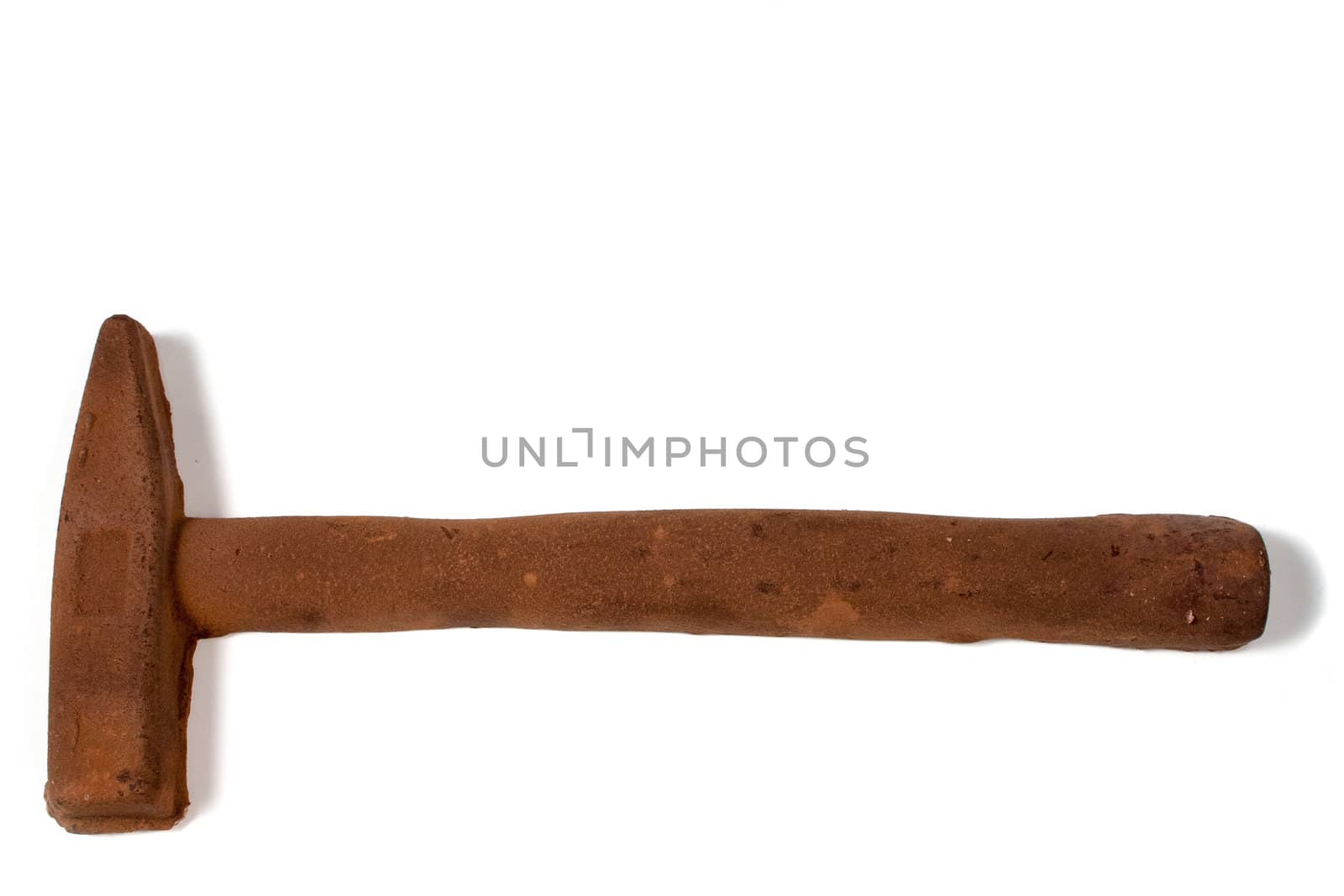 A chocolate hammer on a white background