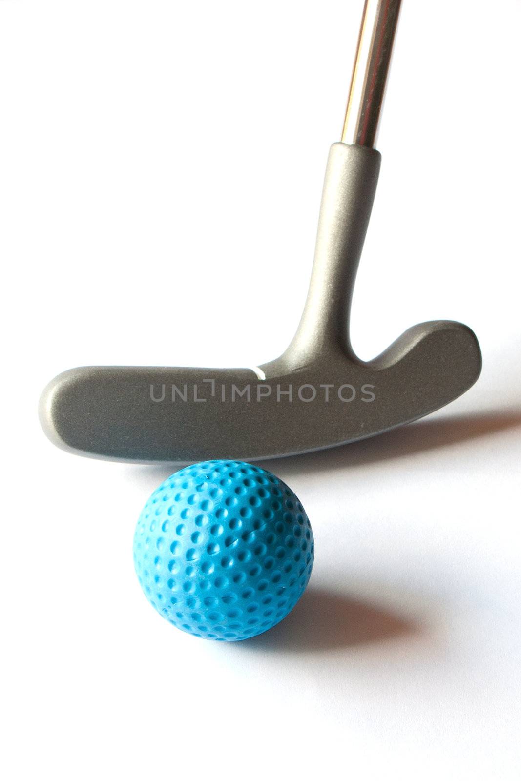 Mini Golf Stick with colored balls on an isolated background