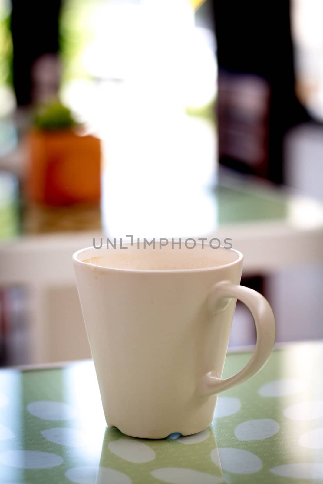 white cup of coffee in coffee shop