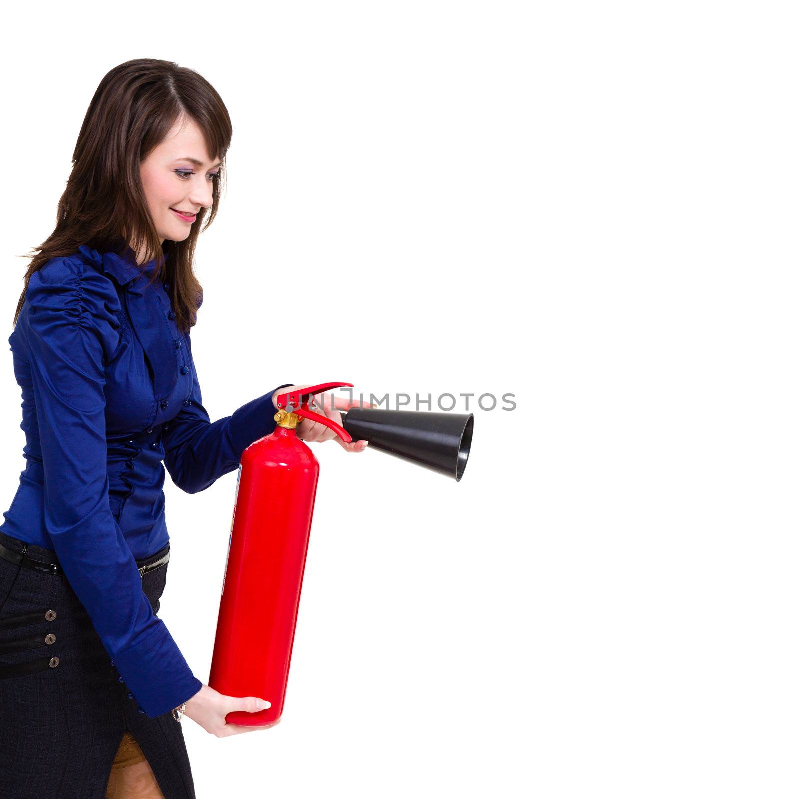 beautiful young businesswoman, using a fire extinguisher isolated on white