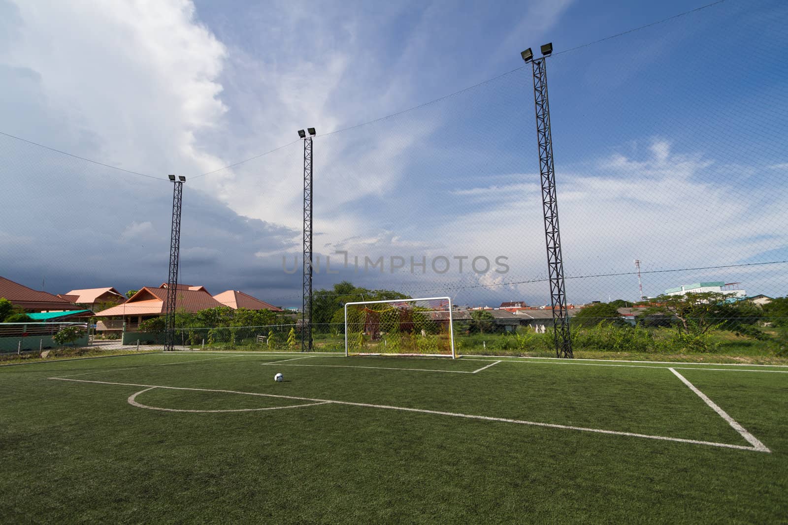 soccer football pitch with green artificial grass