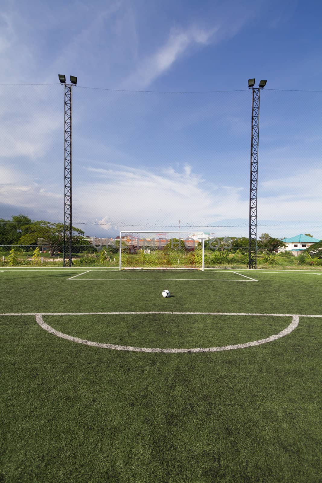 soccer football pitch with green artificial grass