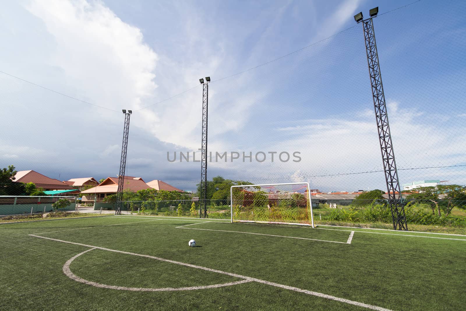 soccer football pitch with green artificial grass