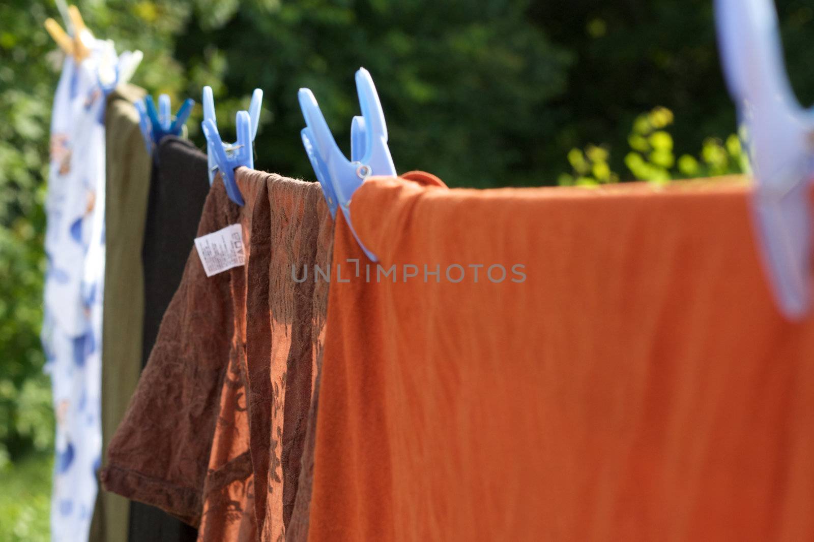 Clothes hanging on a rope to dry outside