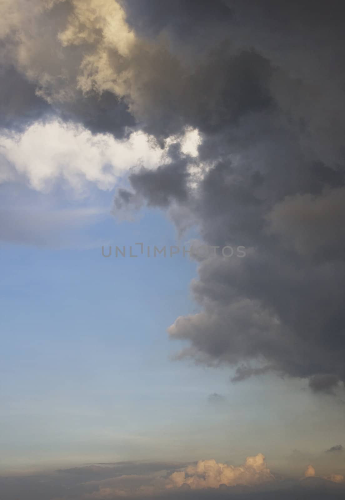 Blue sky with cloud during dusk.