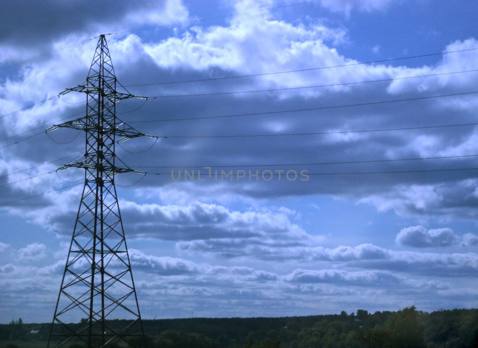 Support of the electricity in bright light on a background of the sky