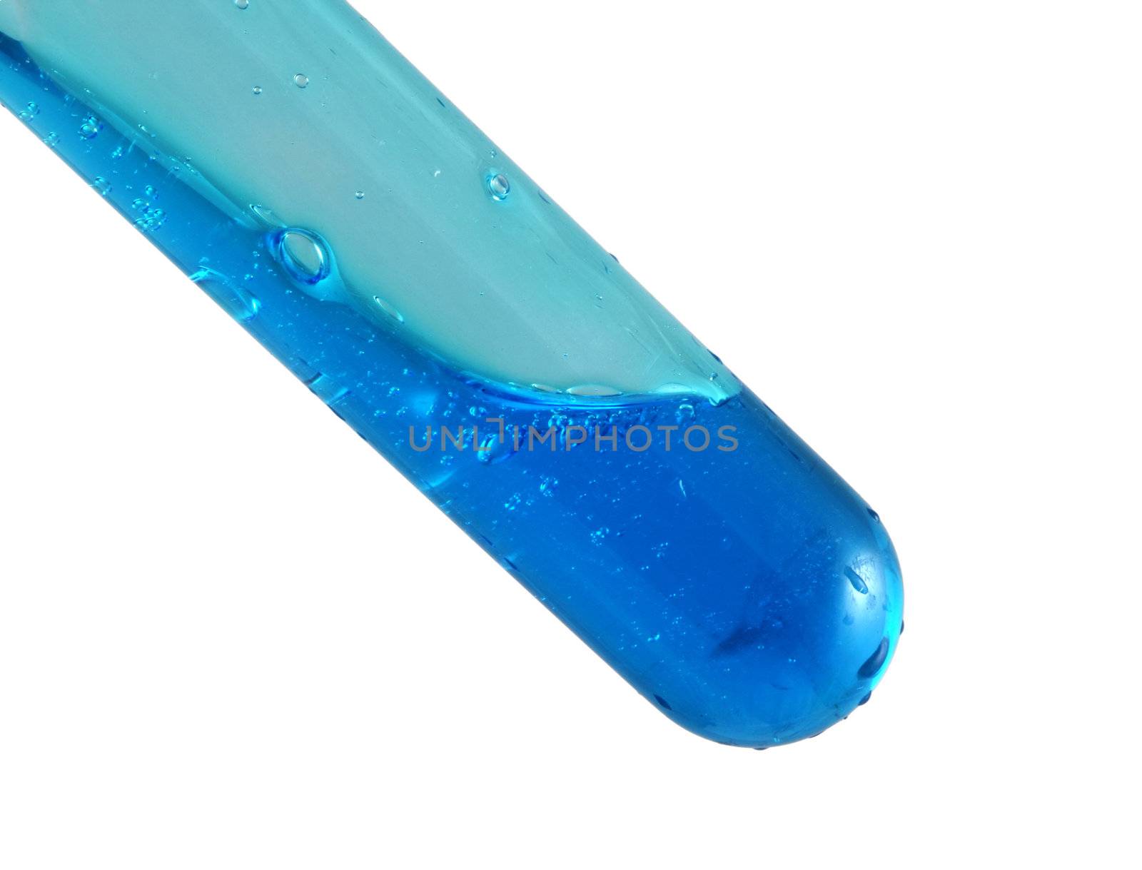 Test tube with a dark blue liquid on a white background