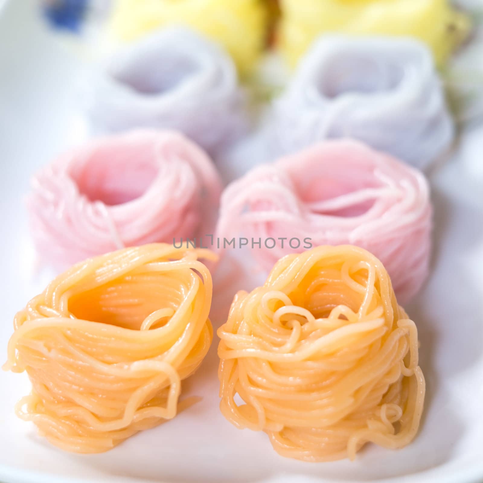 colorful of Thai vermicelli eaten with Thai curry