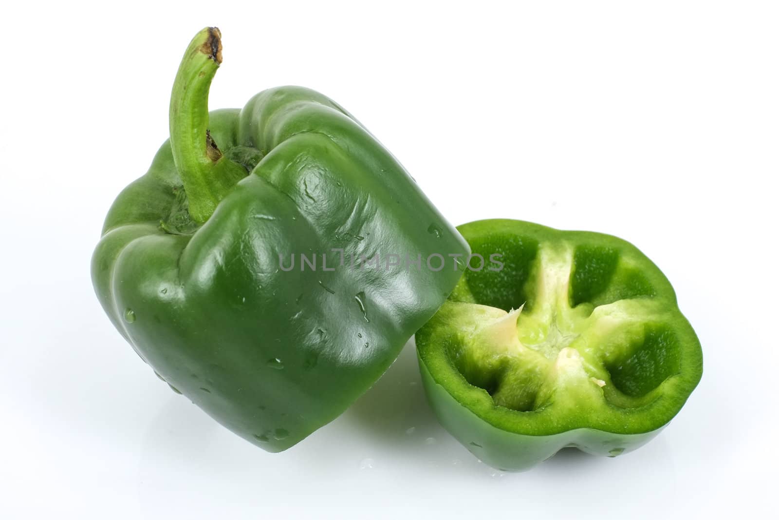 Green sweet peper on white background