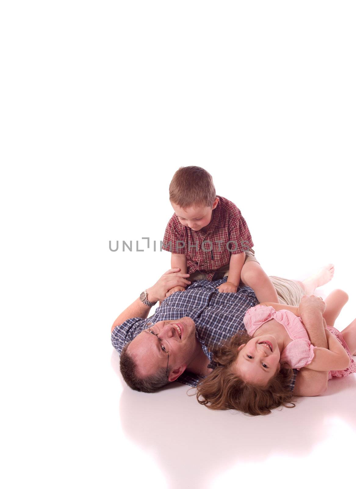 Father, daughter and son playing and laughing (white background)