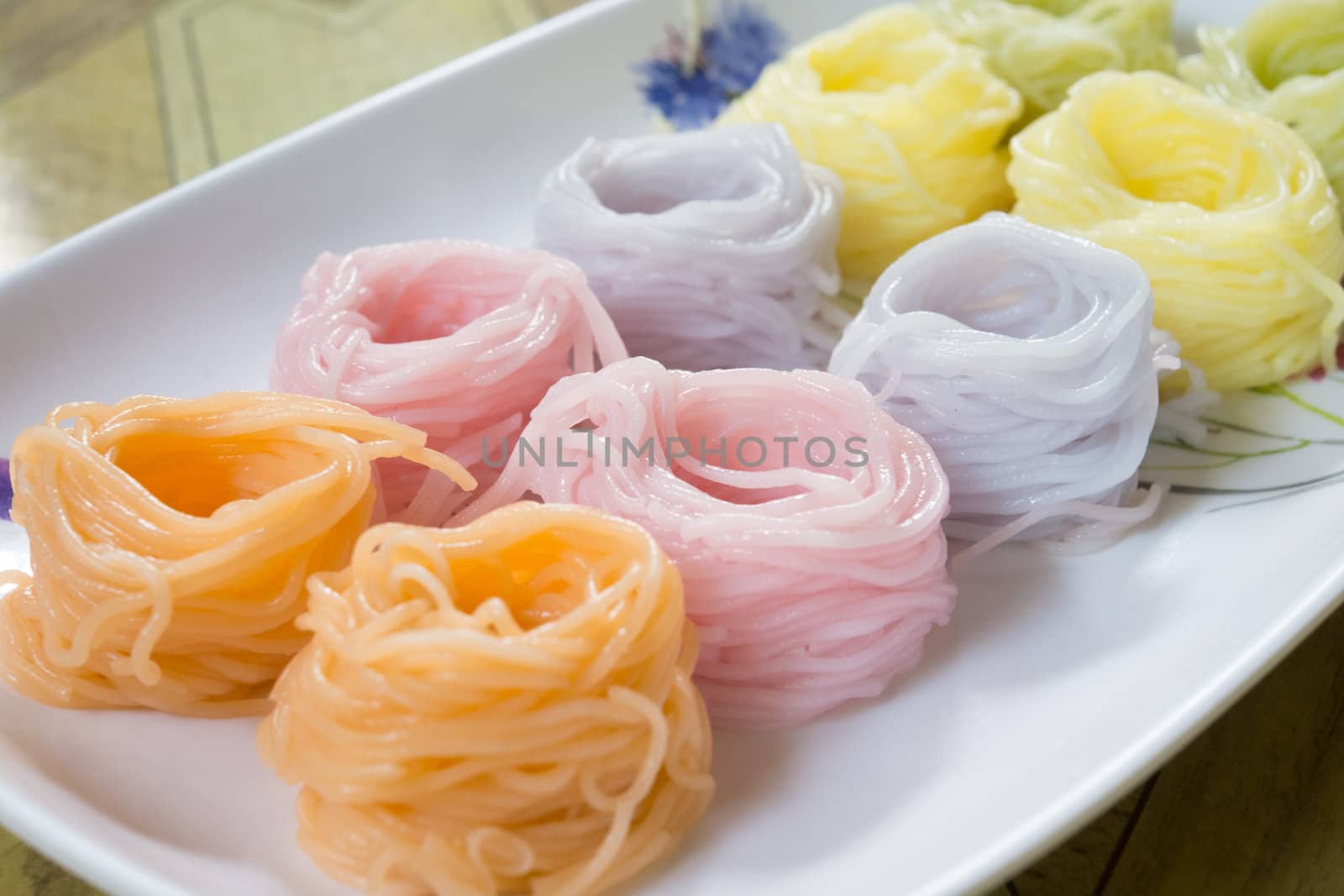 colorful of Thai vermicelli eaten with Thai curry