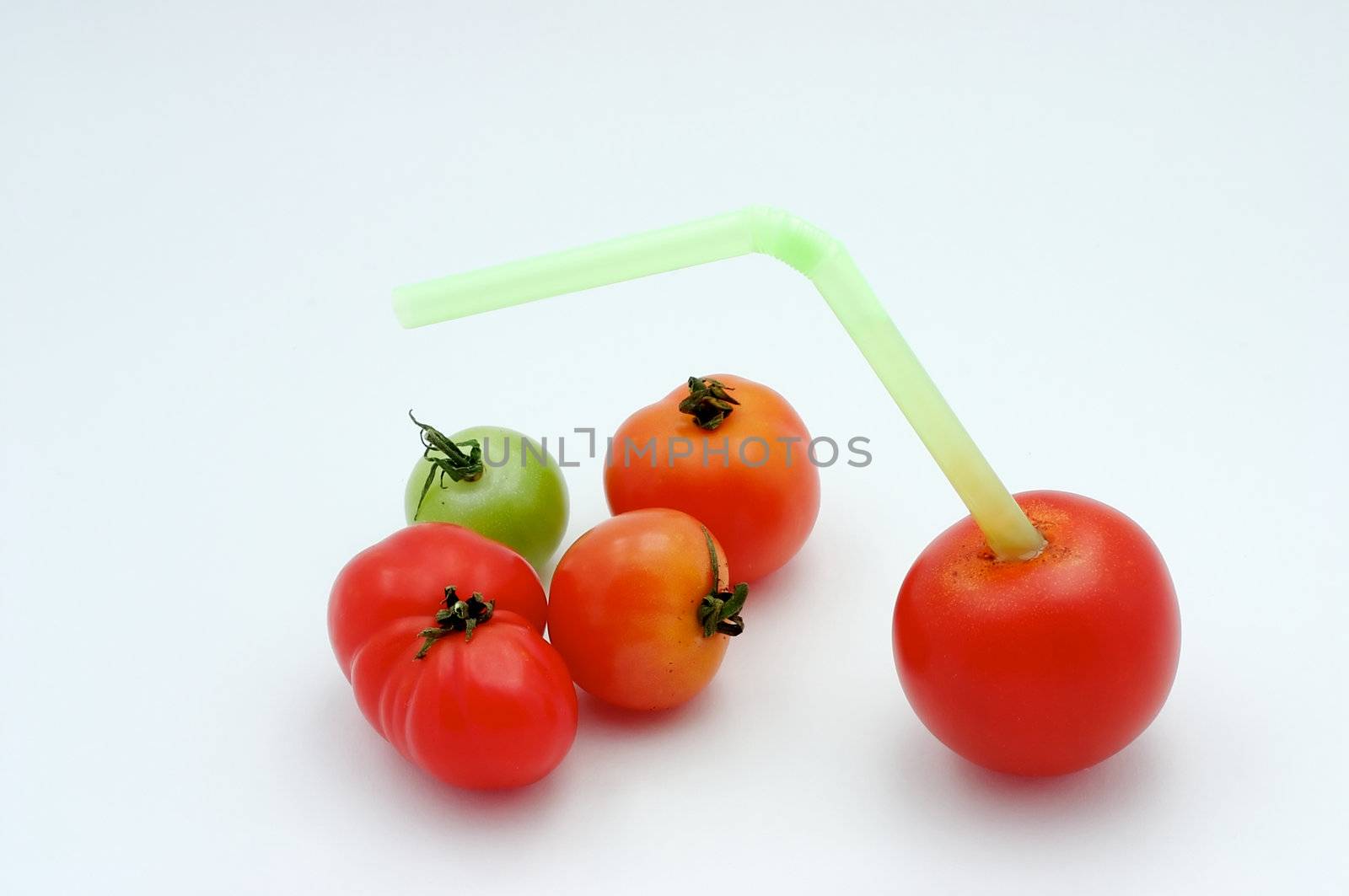 You thought you got a fresh tomato juice before? Can't beat this one. Small tomatoes in a glass filled with water and with a sugar coating with a straw.