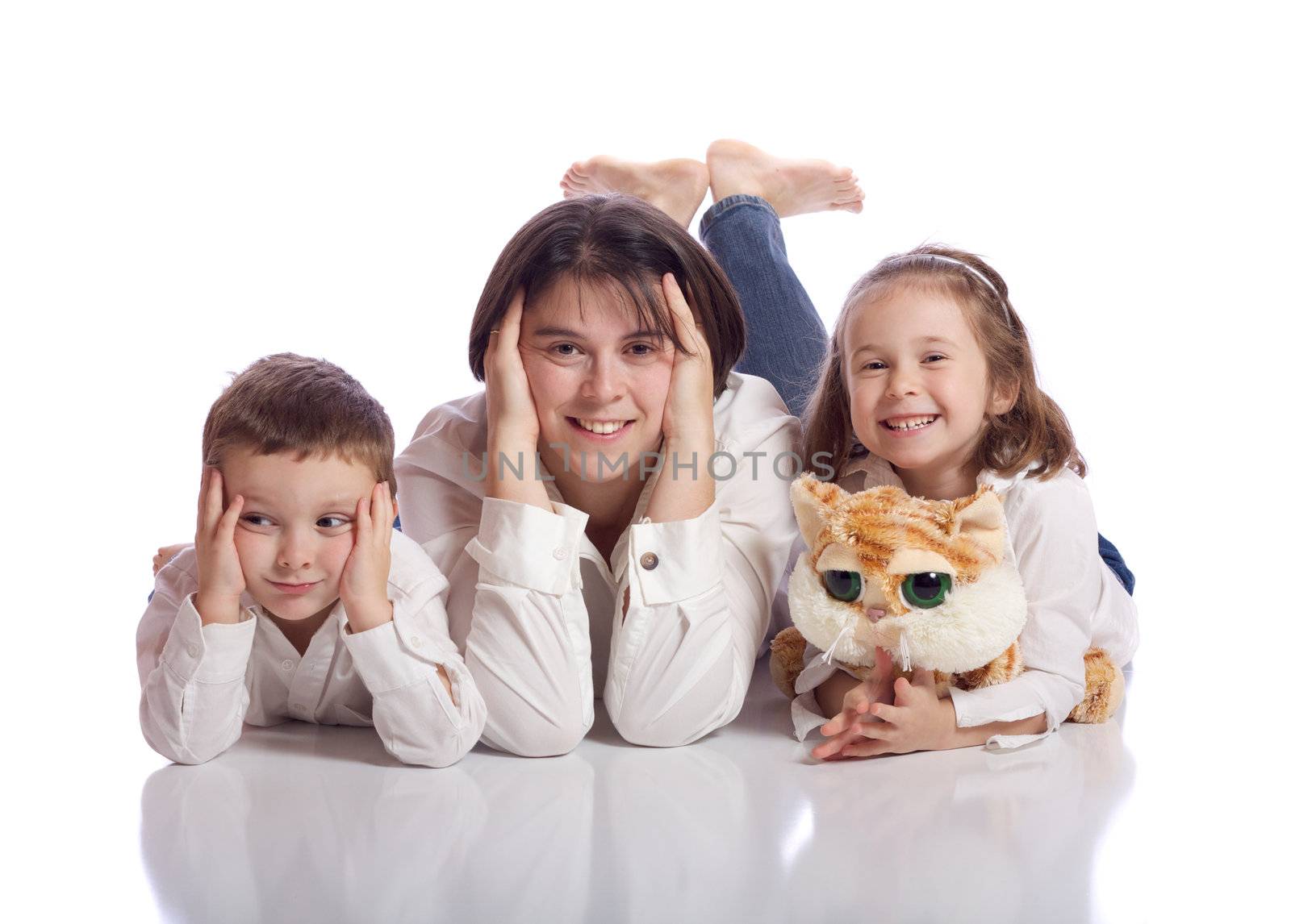 Cute family lying on the ground