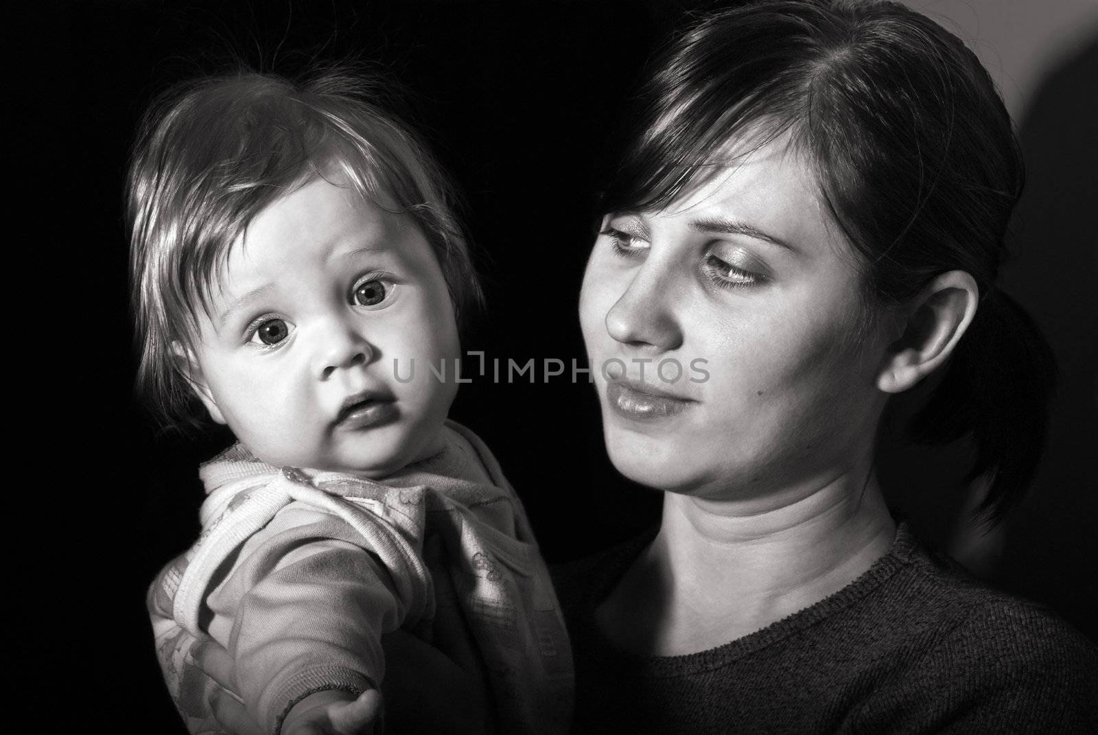 Black and white portrait mother with baby