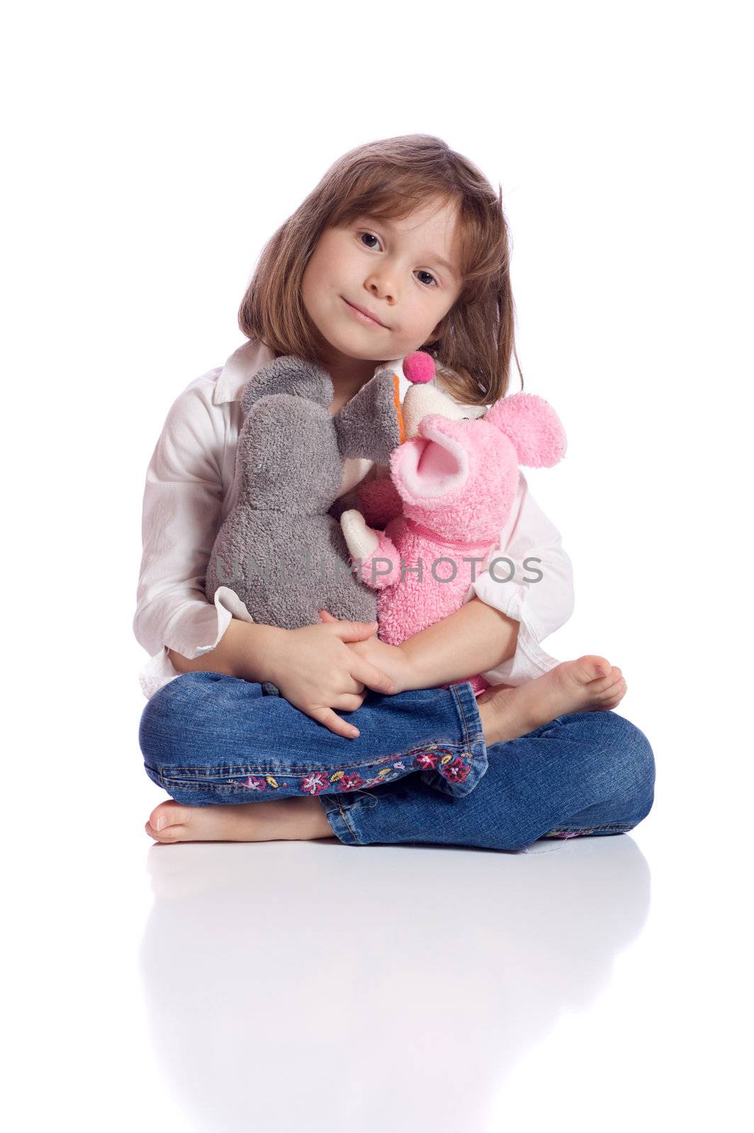 Cute little girl with two teddy
