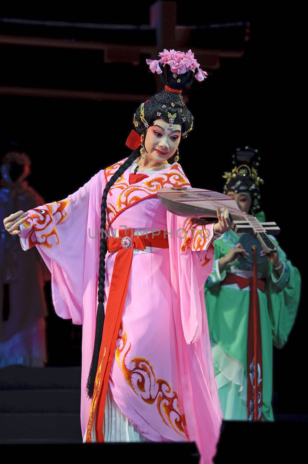 CHENGDU - JUN 6: Chinese Gaojia Opera performer make a show on stage to compete for awards in 25th Chinese Drama Plum Blossom Award competition at Jinsha theater.Jun 6, 2011 in Chengdu, China.
Chinese Drama Plum Blossom Award is the highest theatrical award in China.