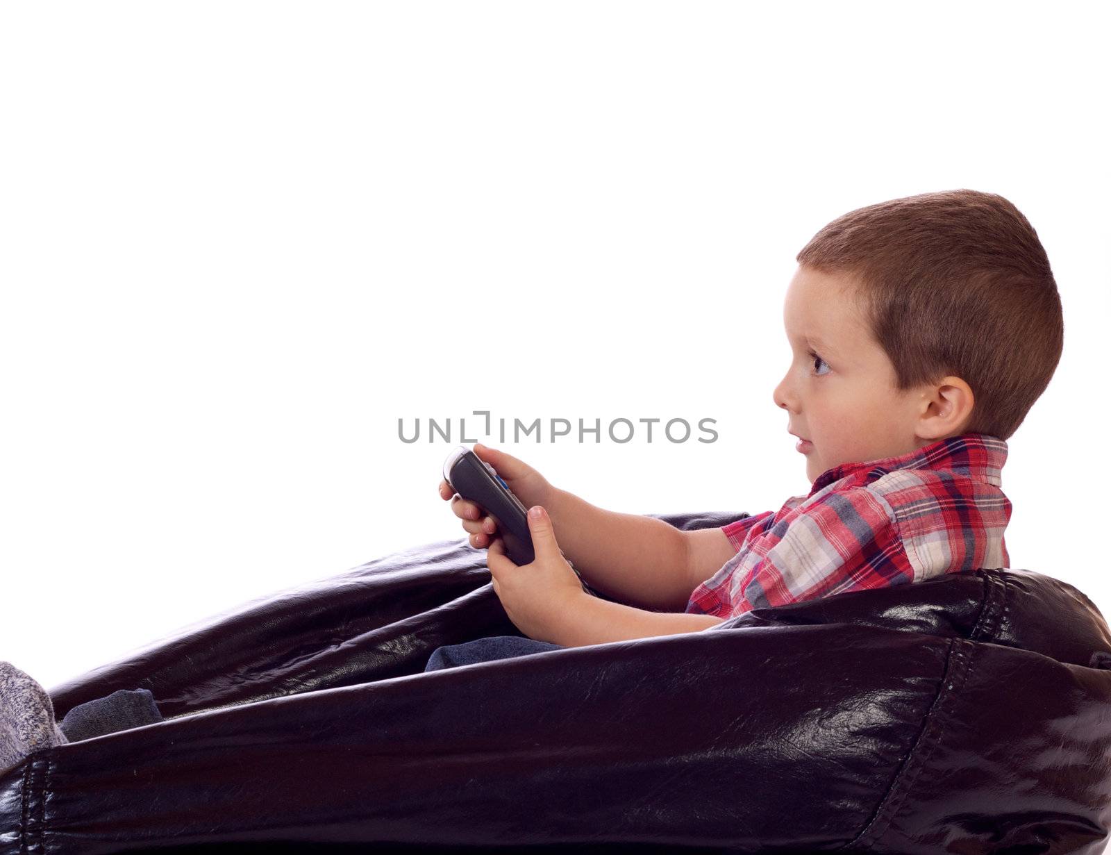 Cute little boy with a remote control