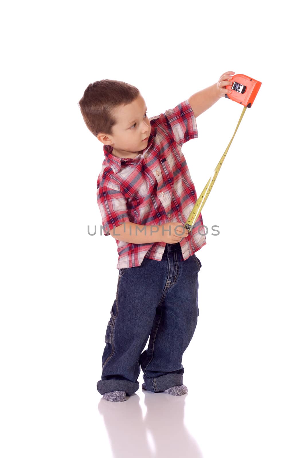Cute little boy with a measuring tape