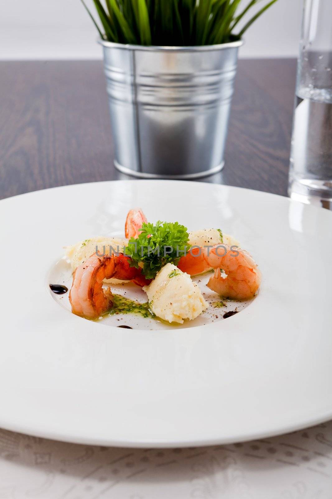 fresh tasty grilled shrimps with potato and kohlrabi puree vegetarian food