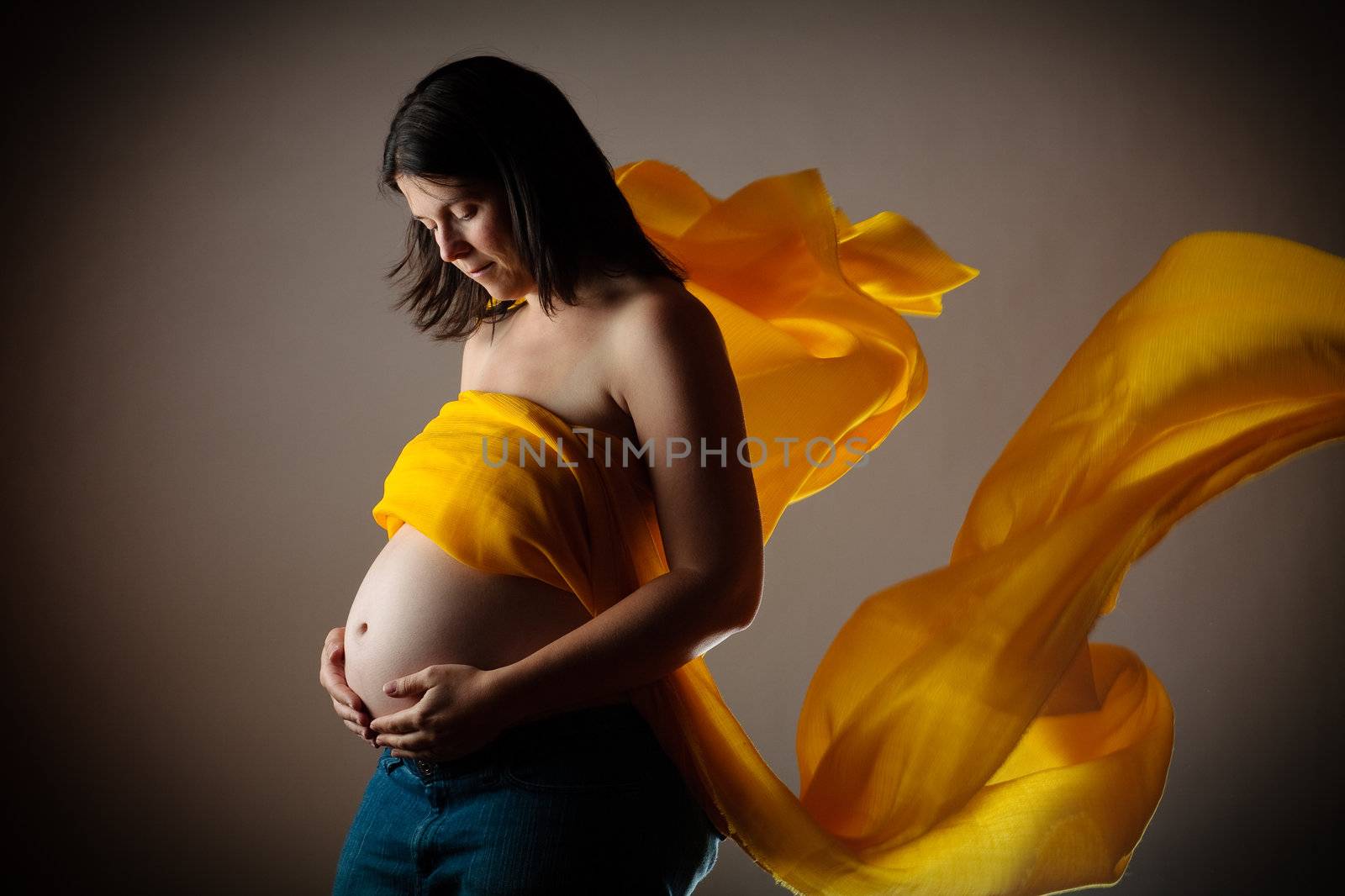 Pregnant woman in studio by Talanis