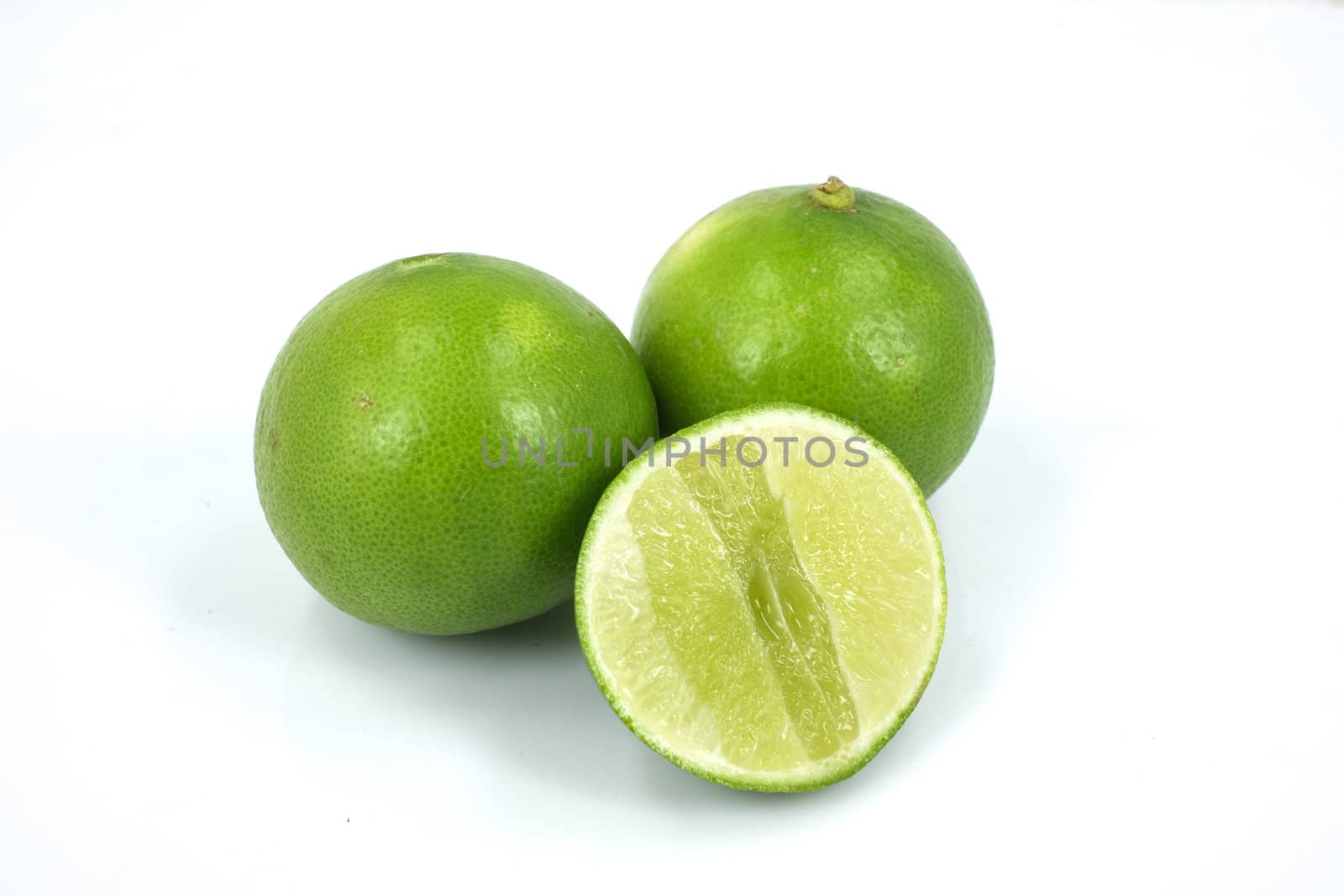 green lemon in white background