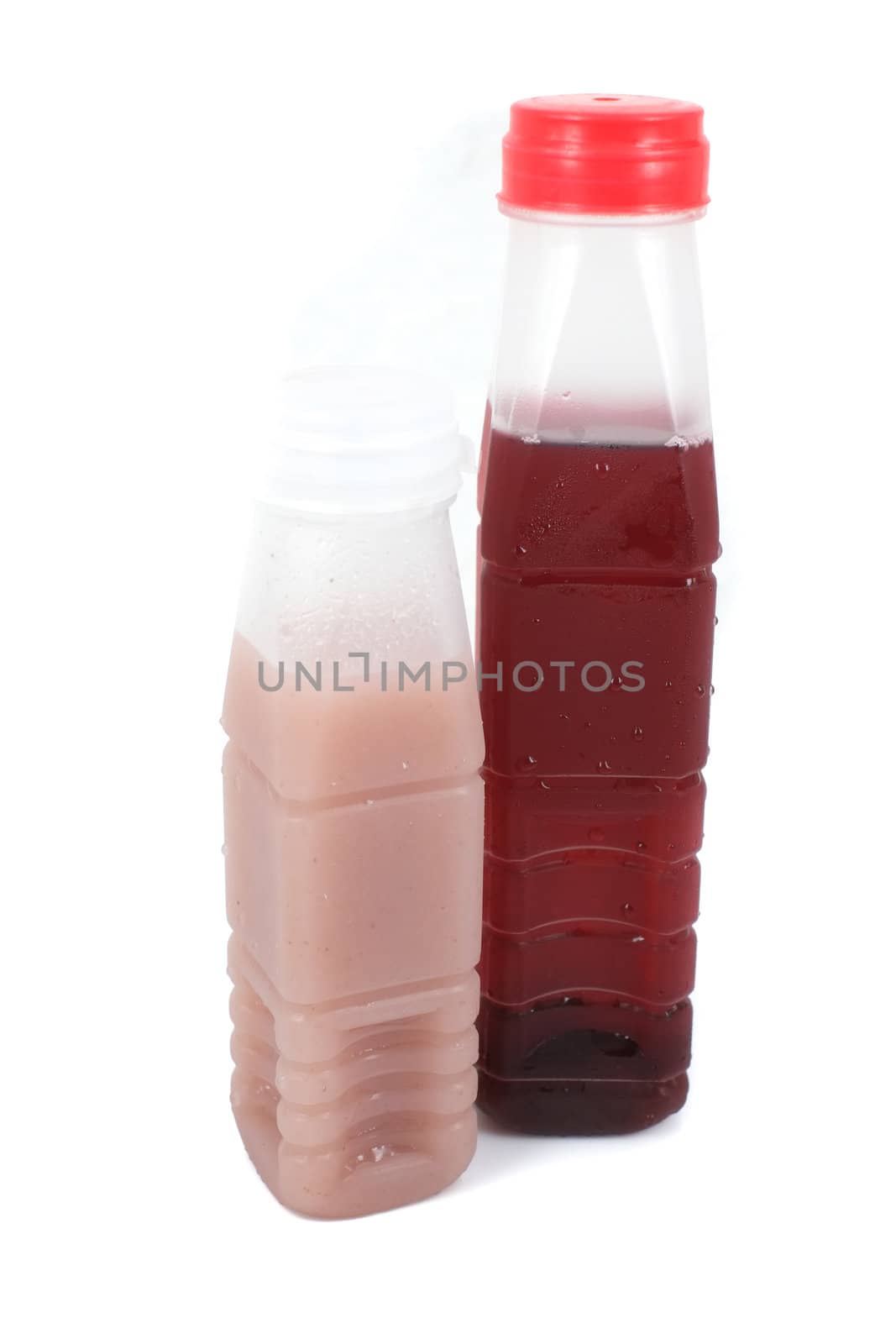 Roselle juice in plastic bottle on whiet background
