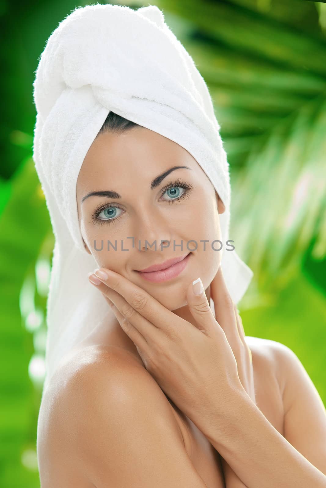 portrait of young beautiful woman  in spa environment by ersler