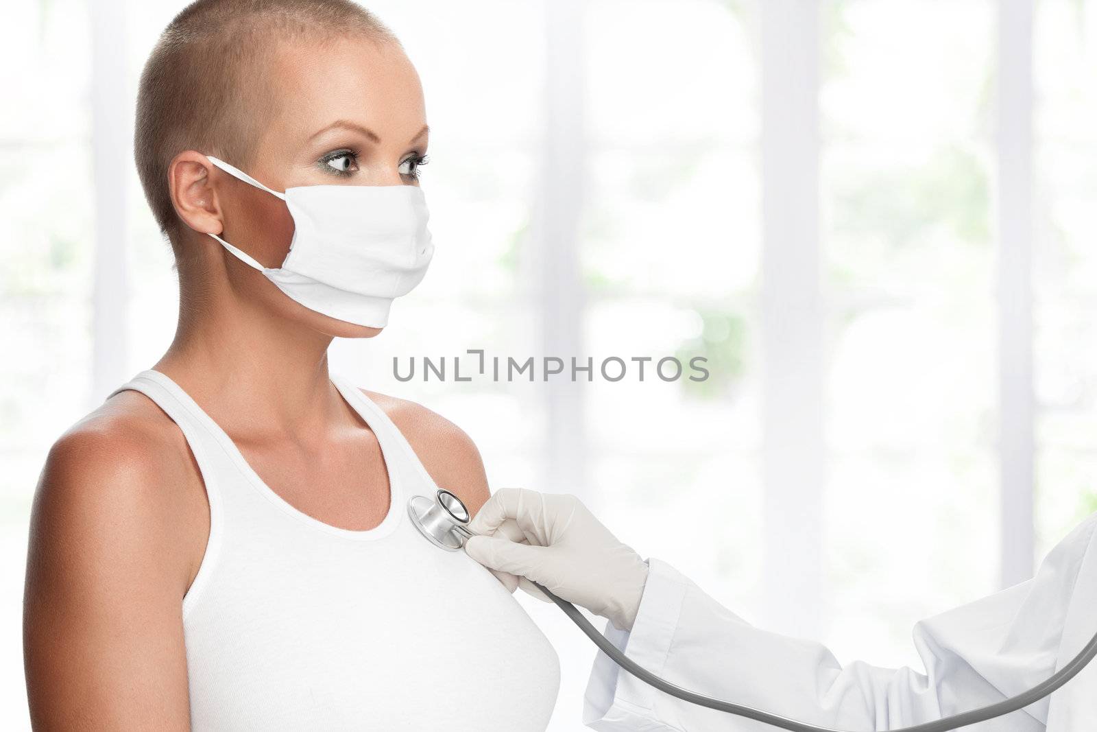 Portrait of young nice woman on medical examination by ersler
