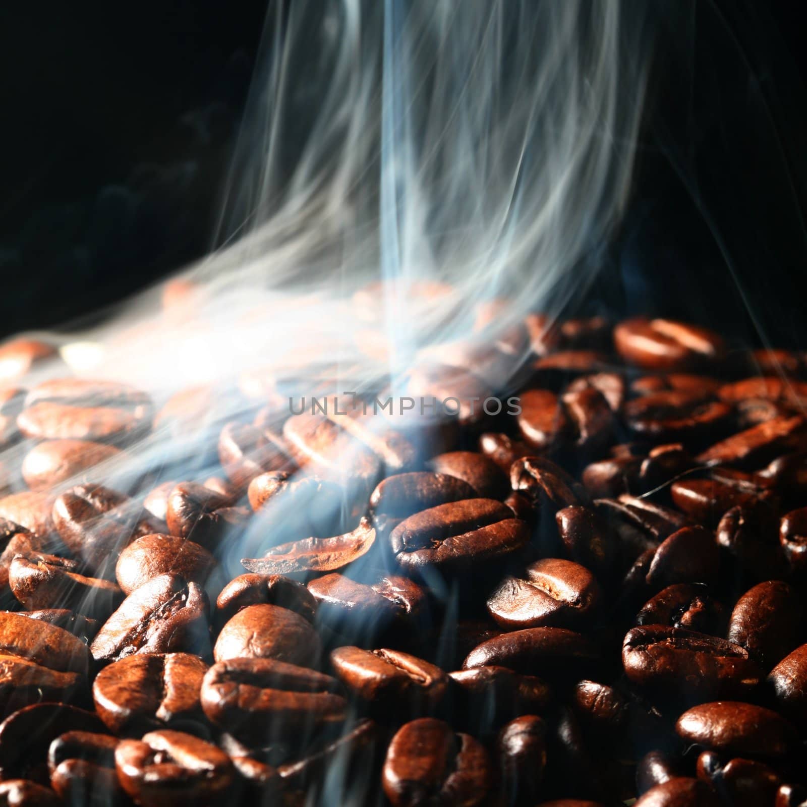 macro coffee beans in aroma smoke