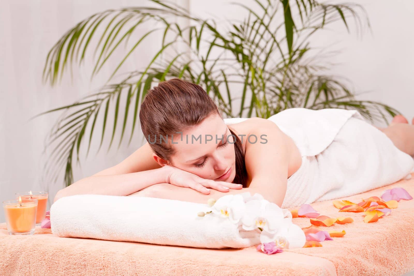 young attractive smilig woman doing wellness spa relaxing massage