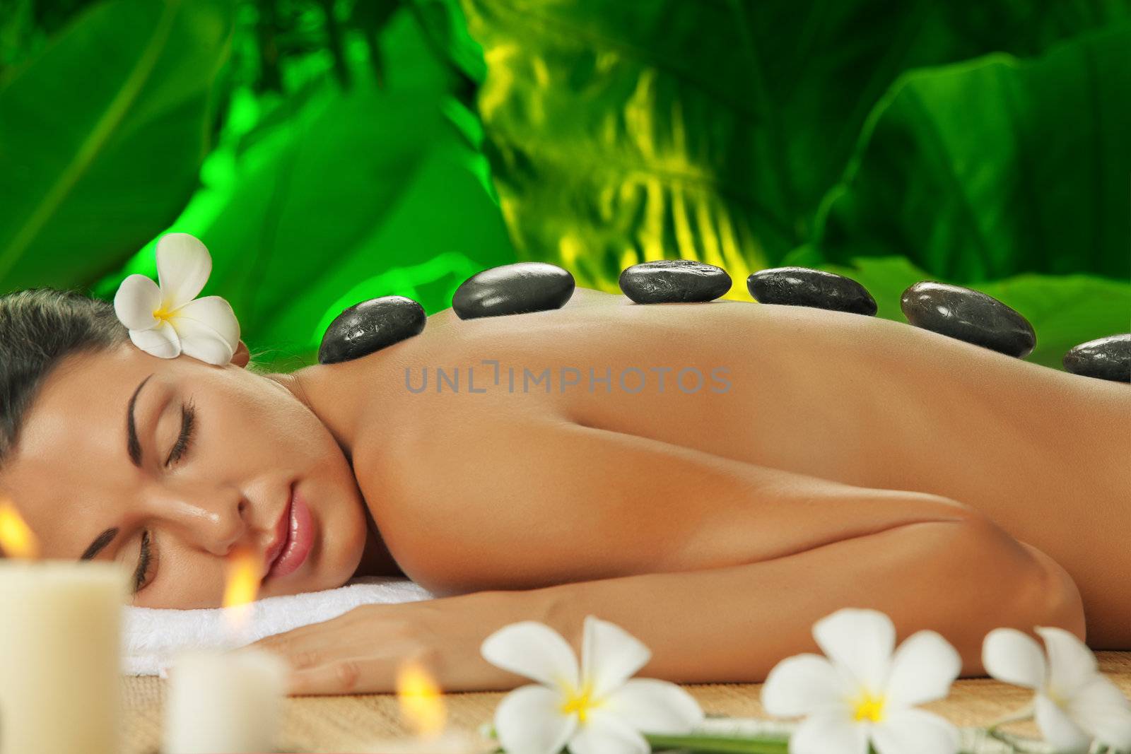 portrait of young beautiful woman  in spa environment by ersler