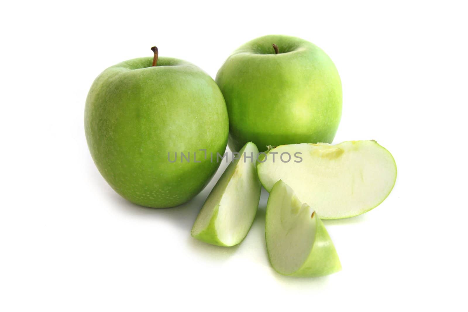 Green apples isolated over white background