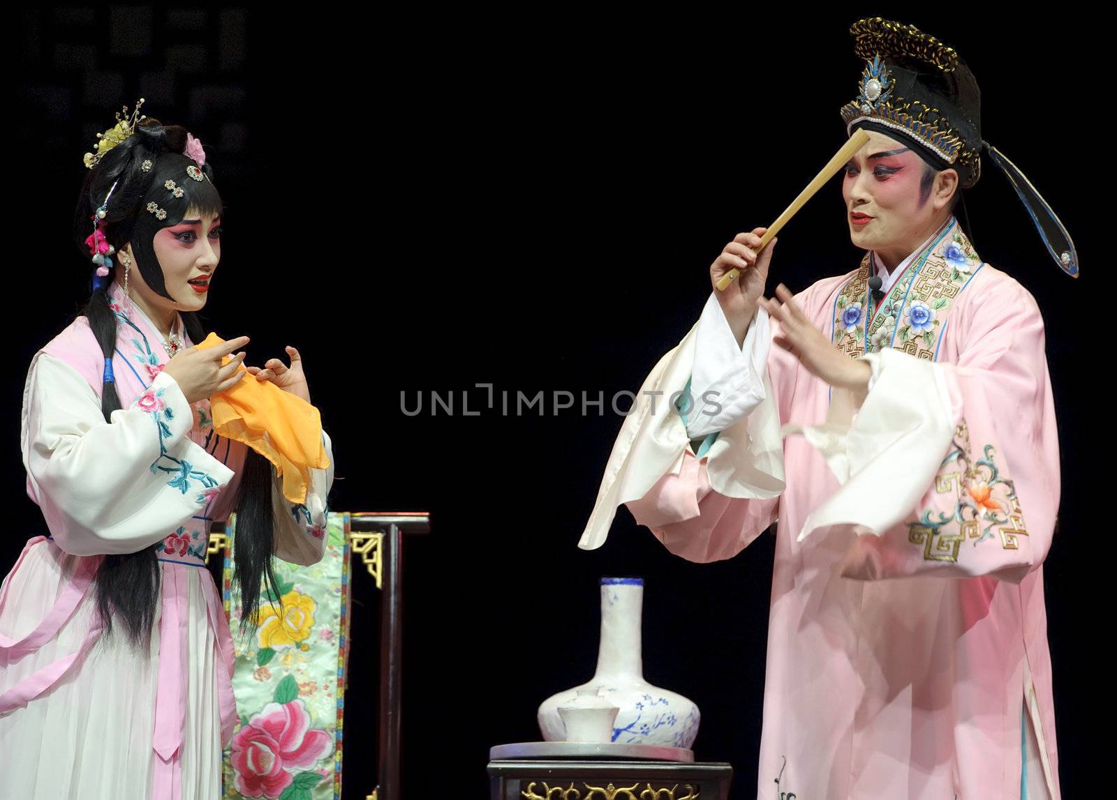 pretty chinese traditional opera actress with theatrical costume