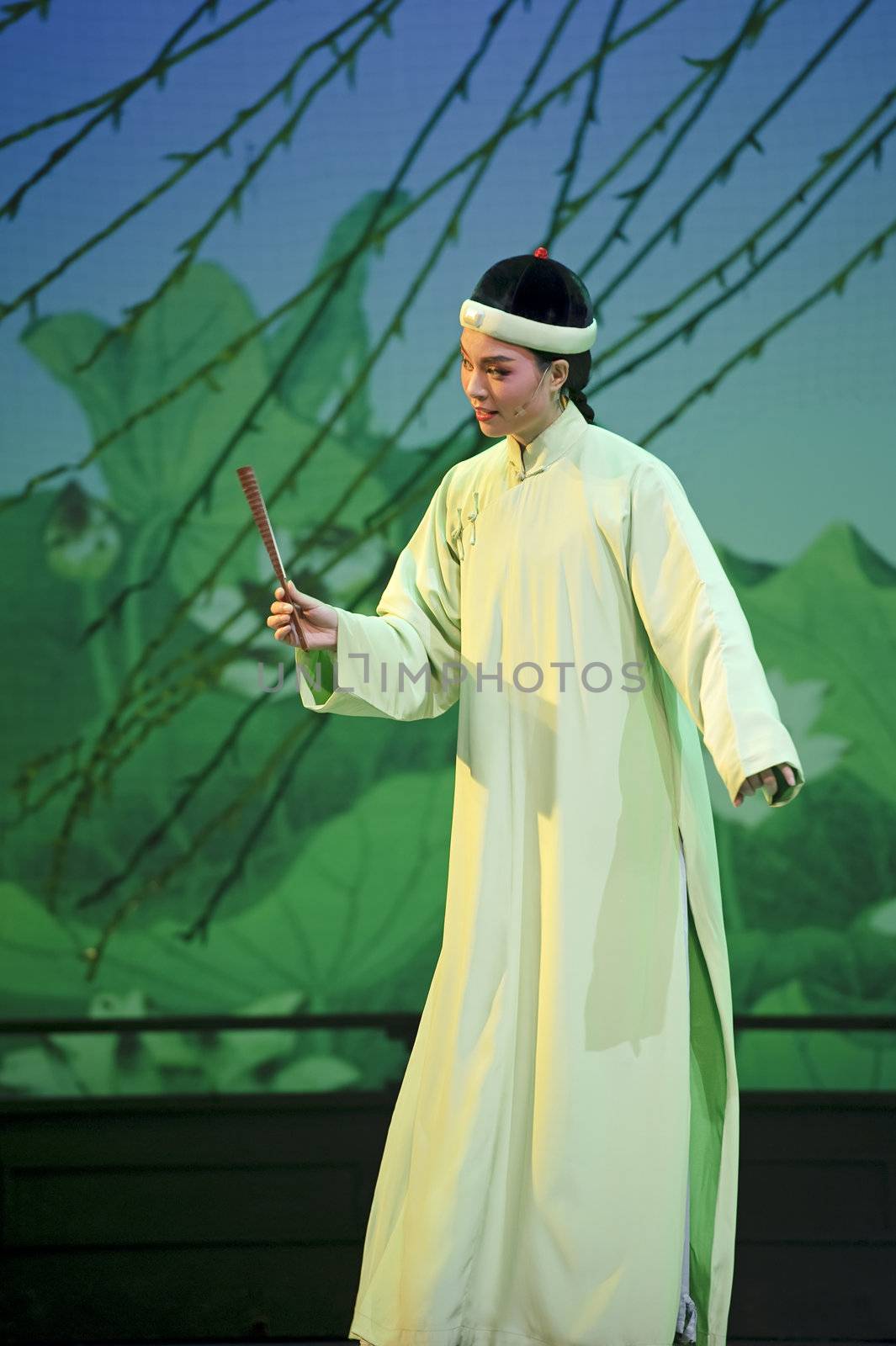 pretty chinese traditional opera actress with theatrical costume