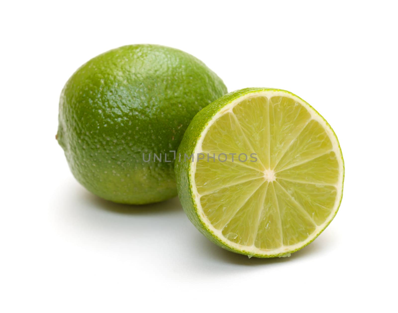 lime and its half on white background