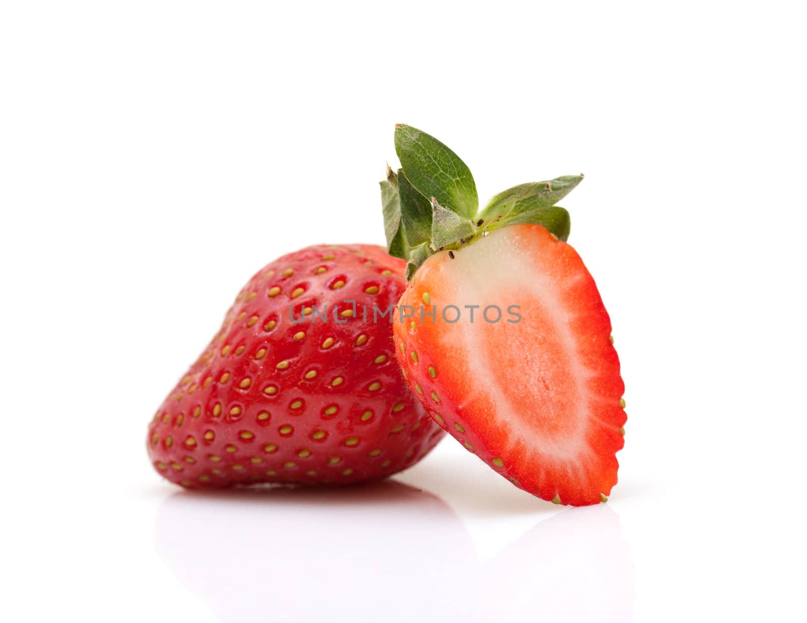 Strawberries closeup over white background