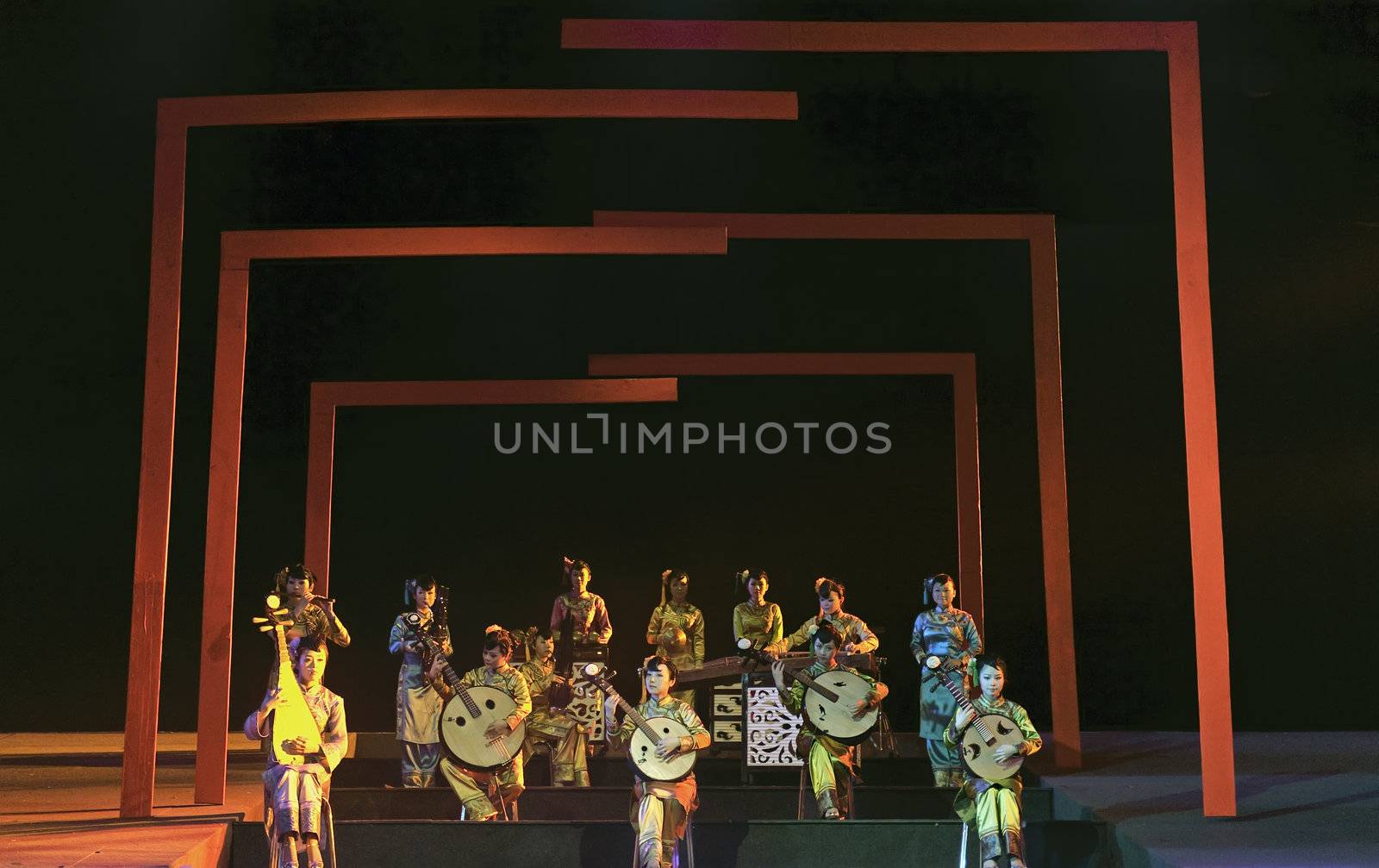 CHENGDU - JUN 17: chinese traditional folk instrumental concert performance on stage at shengge theater.Jun 17, 2011 in Chengdu, China.