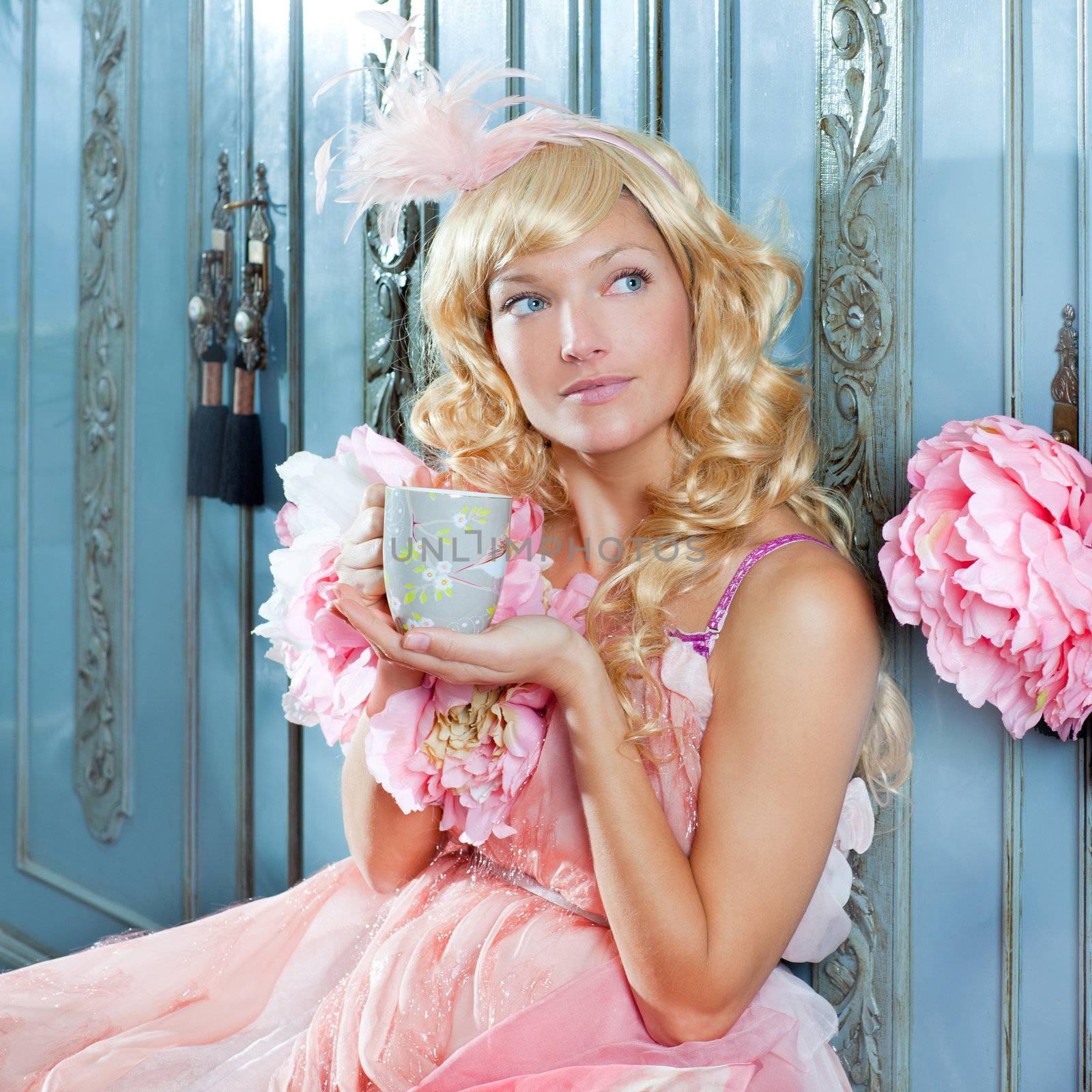 blond fashion princess woman drinking tea or coffee by lunamarina