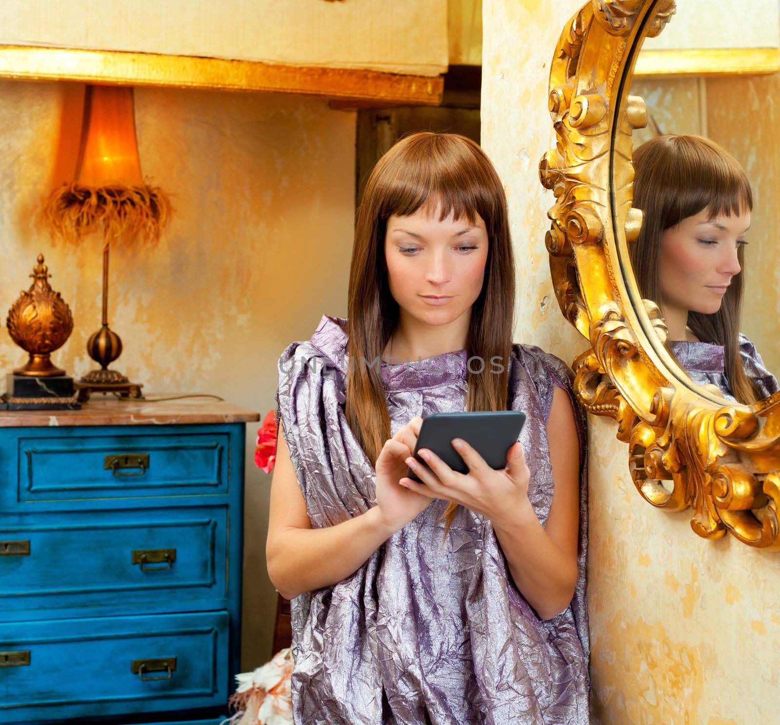 fashion woman reading ebook tablet in vintage grunge house
