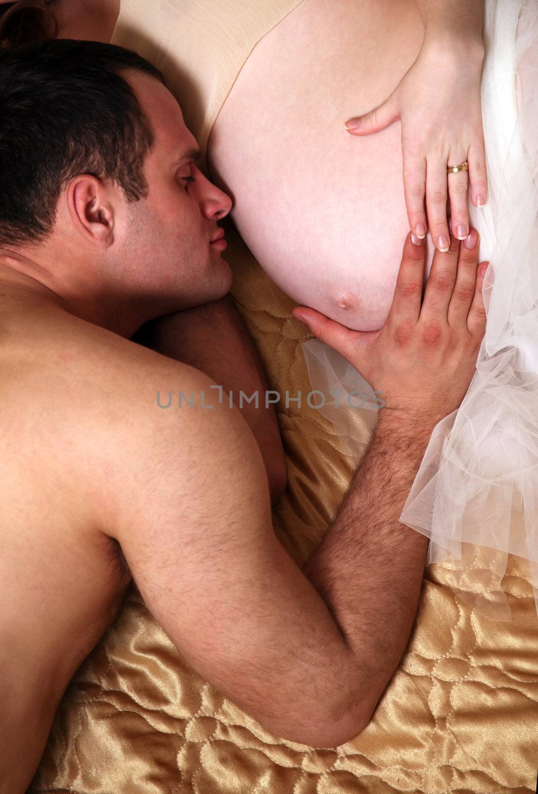 Portrait of a Family Waiting for their Baby