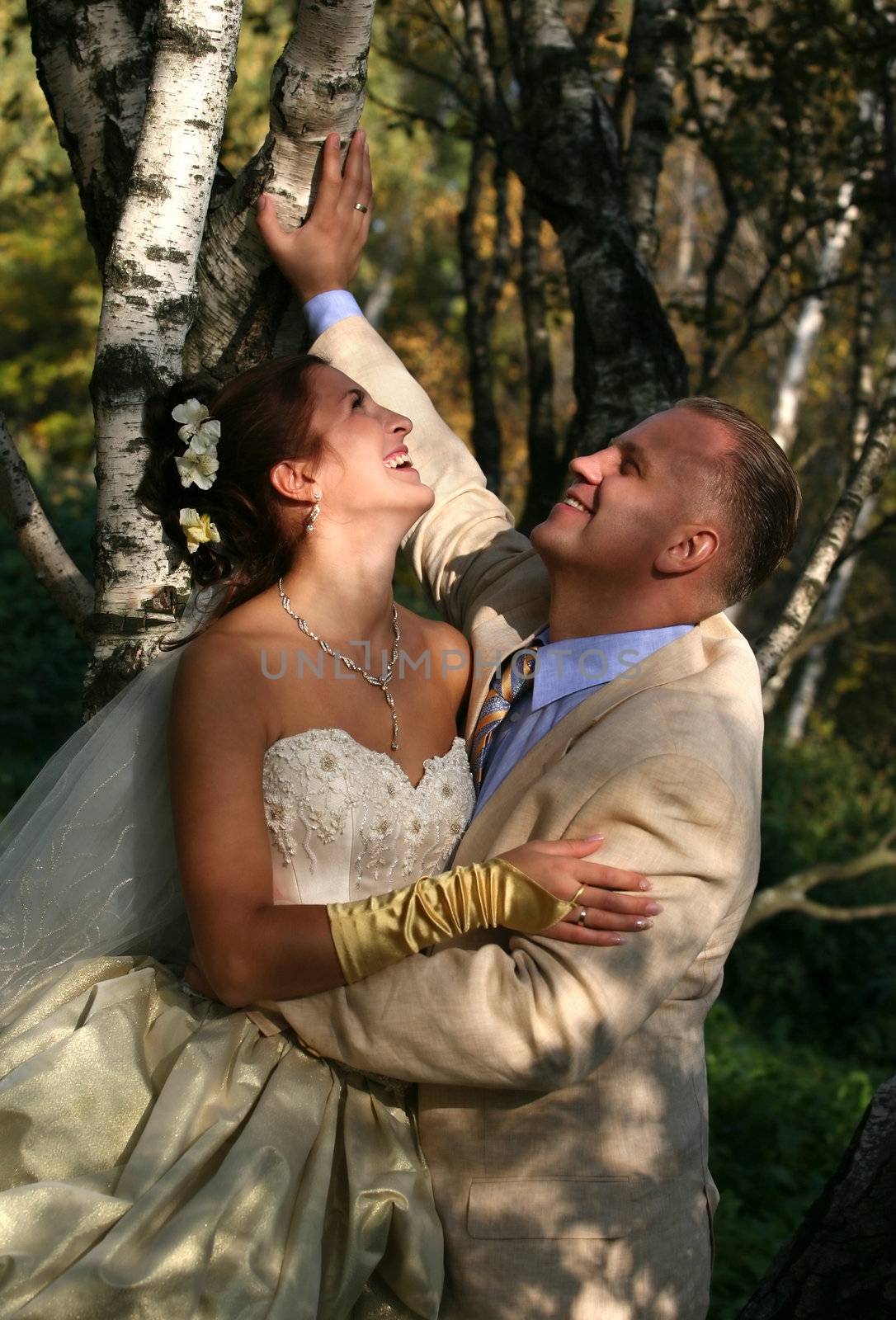 Beautiful the bride and the groom in park