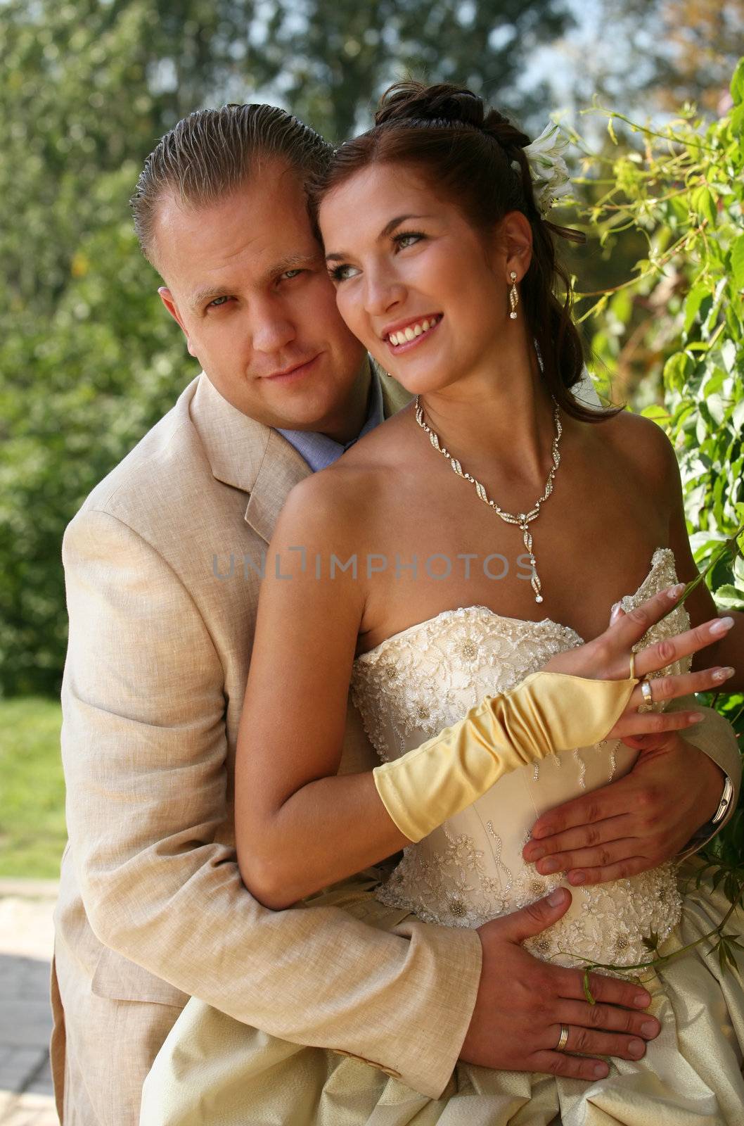 Beautiful newly married pair in park