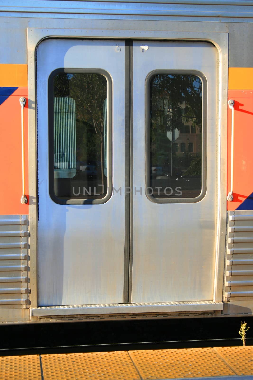 Close up of a passenger train entrance.
