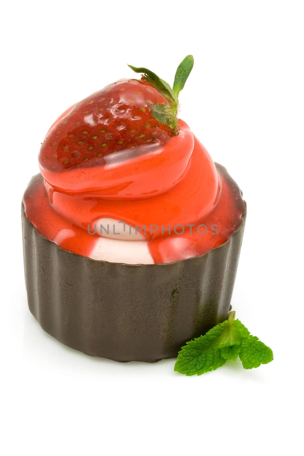 Strawberry cup cake with mint leaves on white background