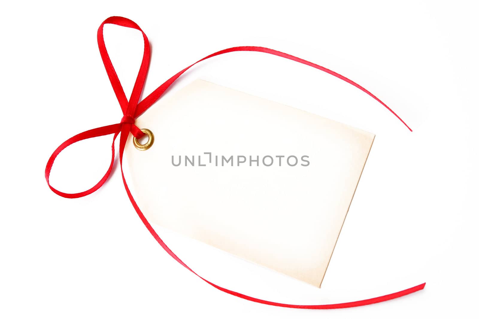blank gift tag tied with a red bow and shot on a white background.