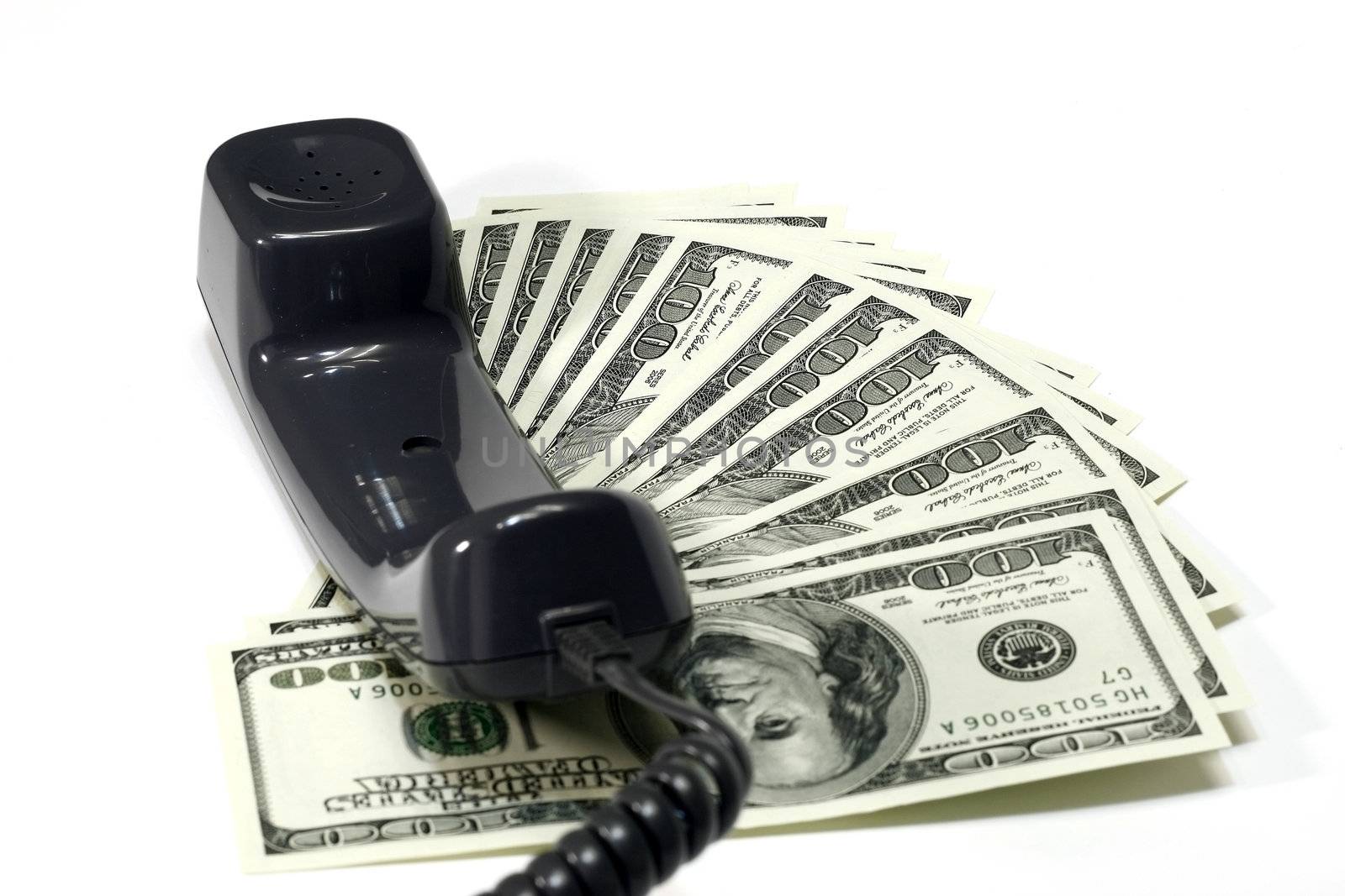 Dollar and Telephone Cord Concept for telephone call expenditures