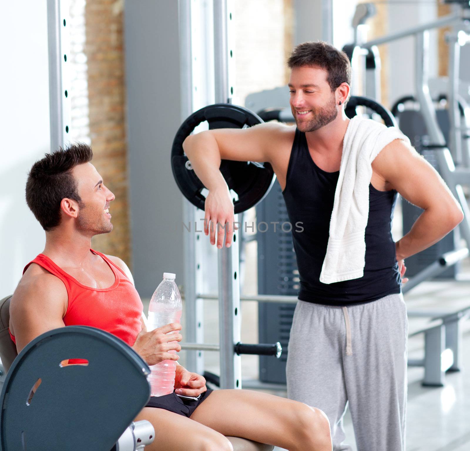 two men on a sport gym relaxed after fitness sport