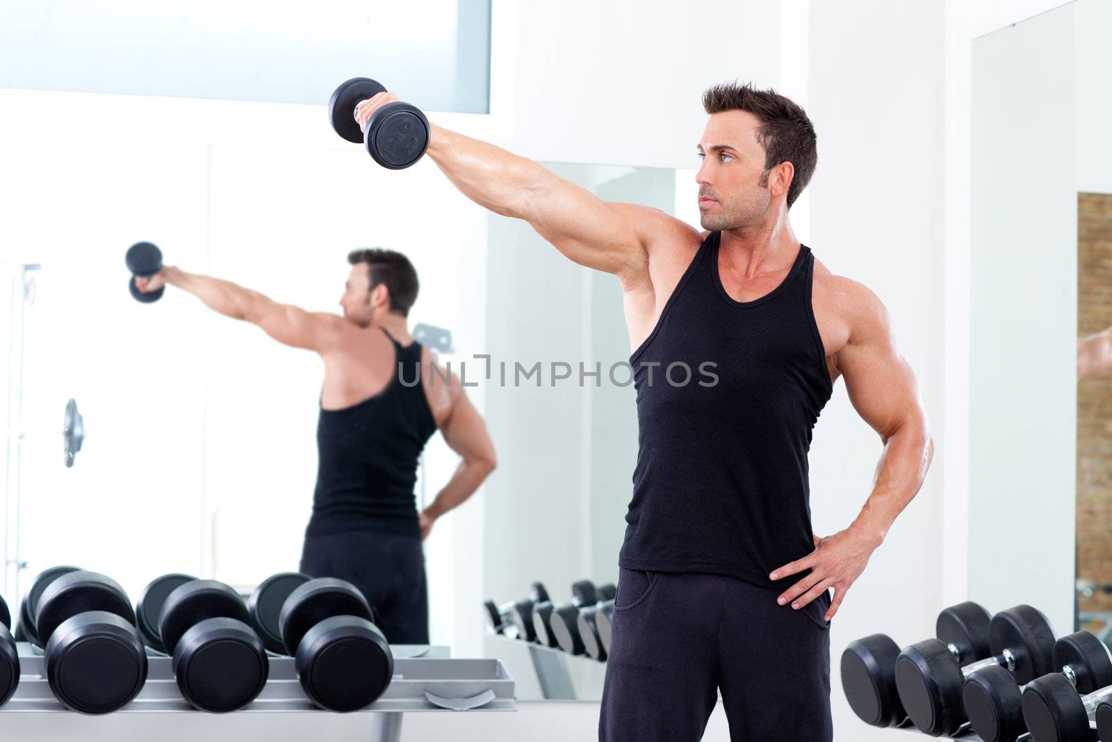 man with weight training equipment on sport gym club