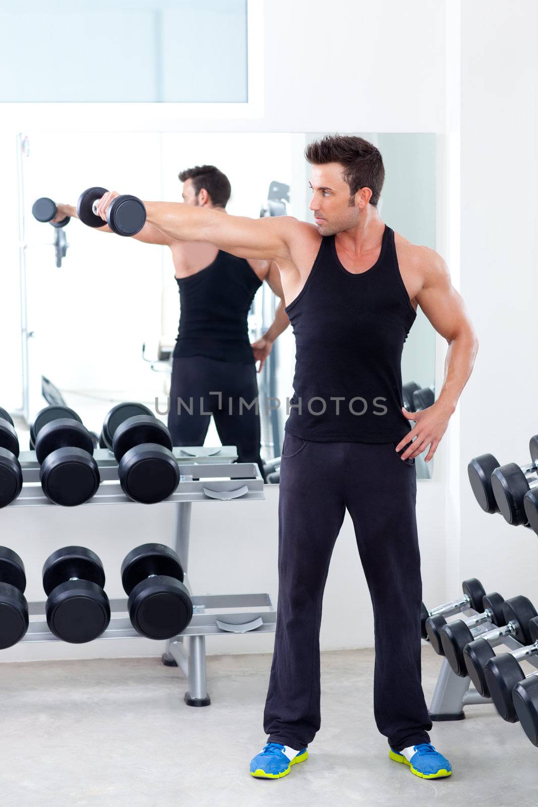 man with weight training equipment on sport gym club