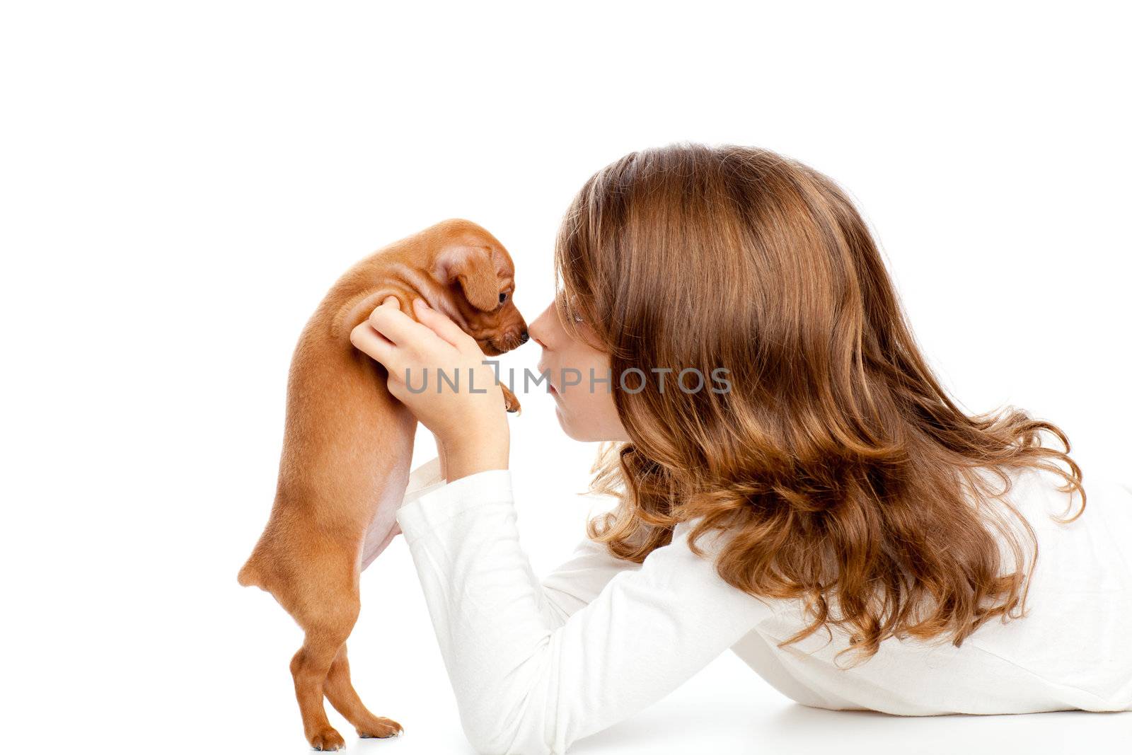 Brunette profile girl with dog puppy mascot mini pinscher on white background